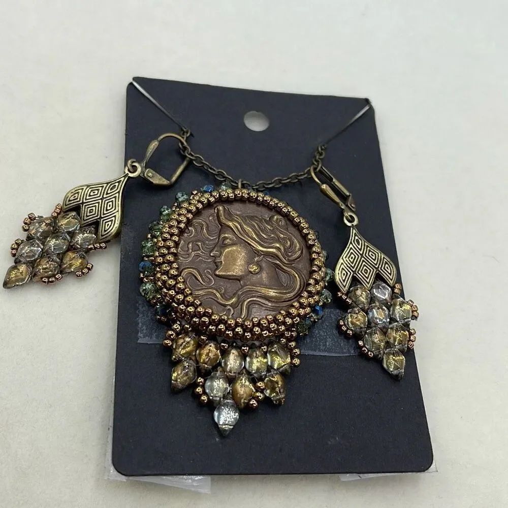 Vintage repurposed Artisan made necklace earrings set.